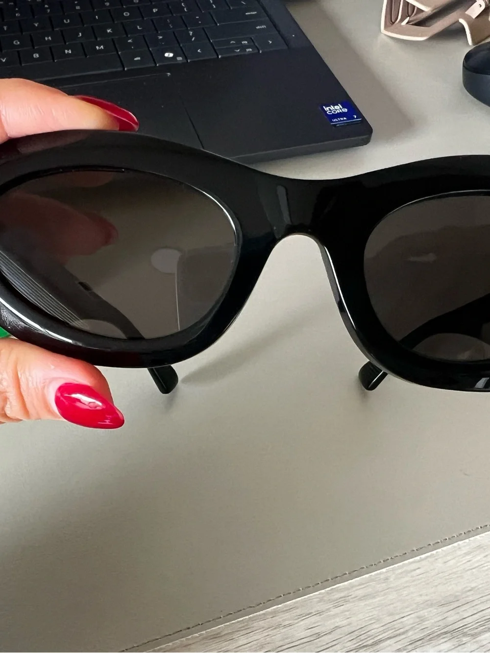 Bottega Veneta Black Oval Sunglasses with Dark Lenses